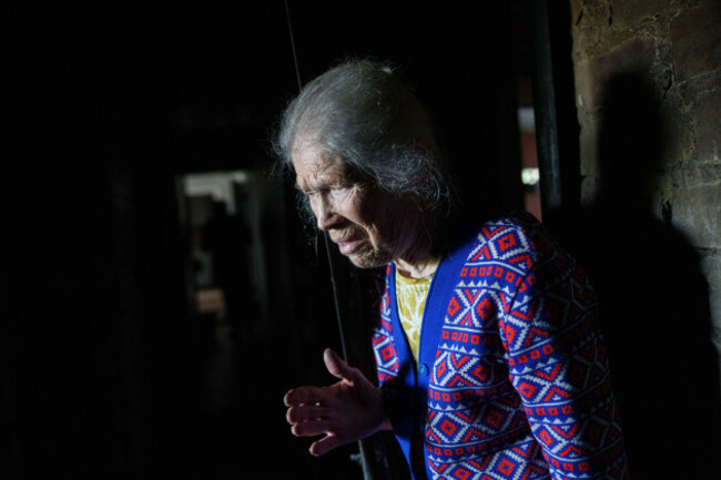 galyna-danilova-84-reacts-while-looking-at-a-burned-apartment-of-a-residential-house-damaged-after-a-russian-strike-on-kyiv-ukraine-on-monday-june-15-2026-ap-photoevgeniy-maloletka