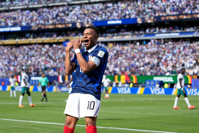 frances-kylian-mbappe-celebrates-after-scoring-the-opening-goal-of-his-team-during-the-world-cup-group-i-soccer-match-between-france-and-senegal-in-east-rutherford-n-j-near-new-york-tuesday-june
