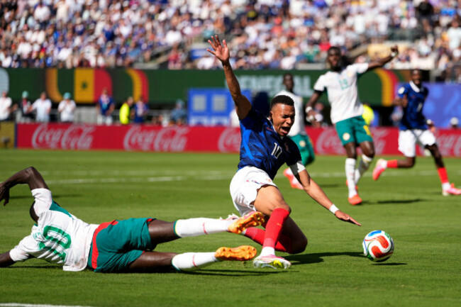 senegals-sadio-mane-left-stops-frances-kylian-mbappe-during-the-world-cup-group-i-soccer-match-between-france-and-senegal-in-east-rutherford-n-j-near-new-york-tuesday-june-16-2026-ap-photo