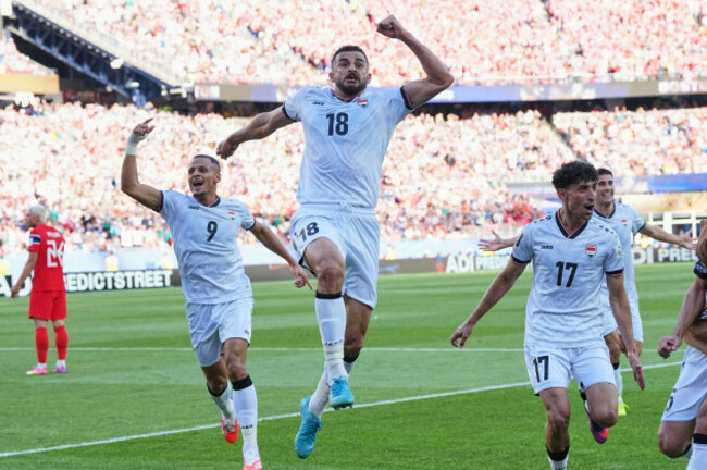 iraqs-aymen-hussein-18-celebrates-scoring-his-sides-first-goal-during-the-world-cup-group-i-soccer-match-between-iraq-and-norway-in-foxborough-mass-near-boston-tuesday-june-16-2026-ap-pho