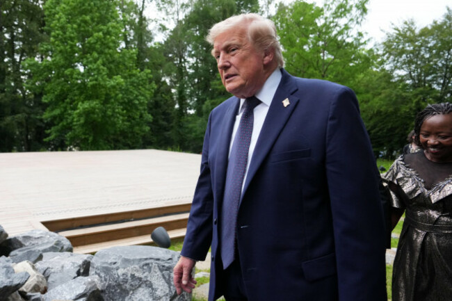 u-s-president-donald-trump-walks-away-after-a-group-photo-of-leaders-at-the-g7-summit-tuesday-june-16-2026-in-evian-les-bains-france-ap-photojulia-demaree-nikhinson