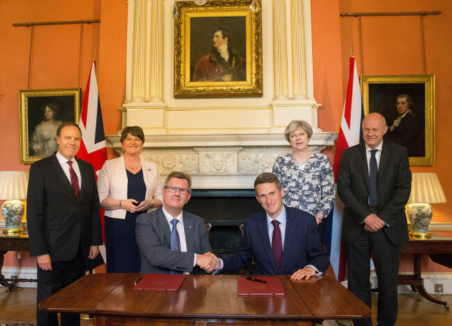 prime-minister-theresa-may-stands-with-first-secretary-of-state-damian-green-right-dup-leader-arlene-foster-second-left-dup-deputy-leader-nigel-dodds-left-as-dup-mp-sir-jeffrey-donaldson-thi