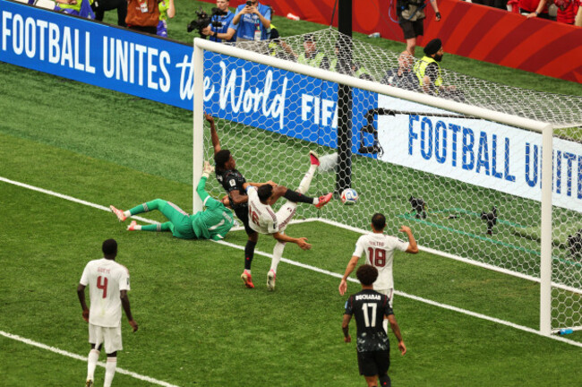 jonathan-david-second-from-left-scores-their-third-goal-past-qatars-boualem-khoukhi-center-during-the-world-cup-group-b-soccer-match-between-canada-and-qatar-in-vancouver-british-columbia-thurs