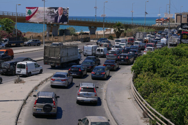 displaced-people-fleeing-israeli-strikes-in-southern-lebanon-sit-in-traffic-on-a-highway-leading-to-beirut-in-the-southern-port-city-of-sidon-lebanon-friday-june-19-2026-ap-photomohammed-zaat