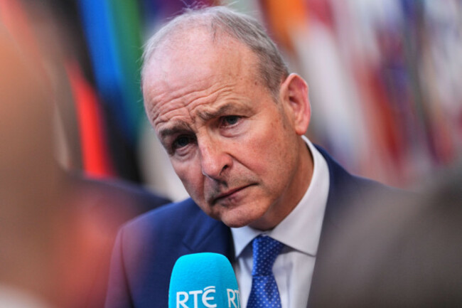 irelands-prime-minister-micheal-martin-talks-to-journalists-as-she-arrives-for-the-eu-summit-in-brussels-thursday-june-18-2026-ap-photomarius-burgelman
