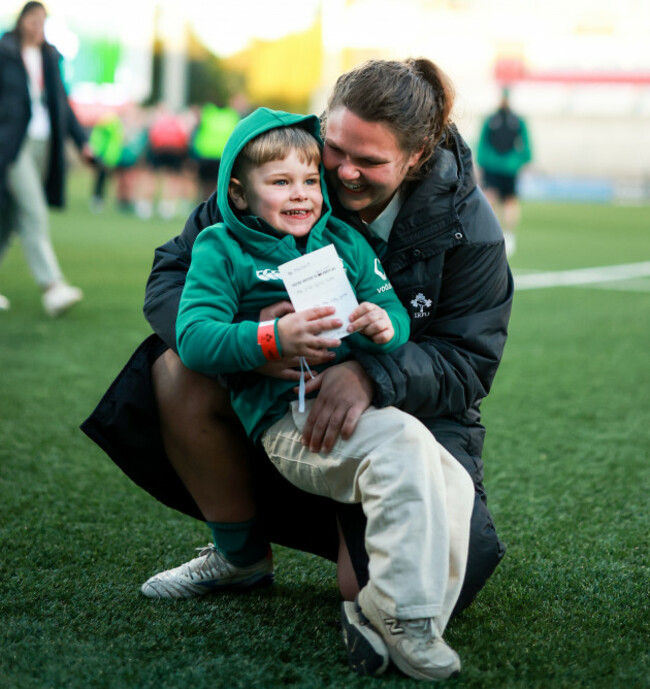 ellena-perry-with-her-son-bert-after-the-game