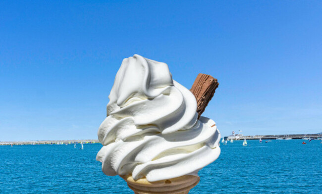a-99-ice-cream-set-against-a-blue-sky-and-clear-blue-sea