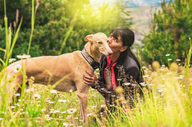 beautiful-woman-kissing-her-dog-outdoors-girl-with-her-dog-cute-dog-loves-her-owner