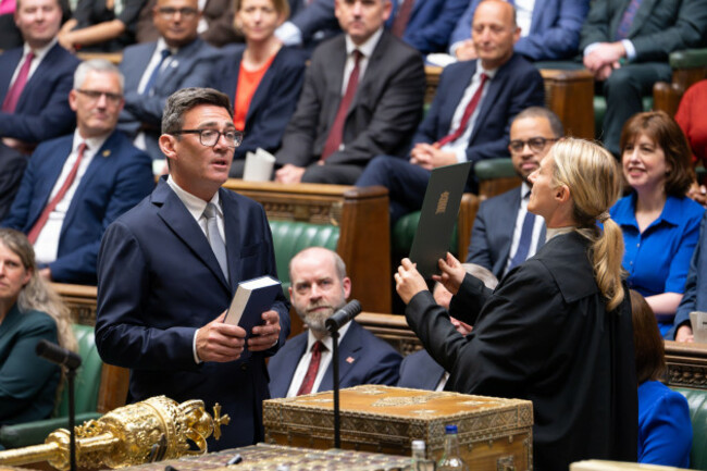andy-burnham-front-left-is-sworn-in-as-an-mp-in-the-house-of-common-in-london-england-monday-june-22-2026-house-of-commons-via-ap