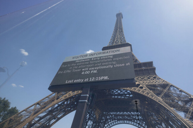 paris-france-24th-june-2026-a-view-of-an-information-board-in-front-of-the-eiffel-tower-announcing-its-closure-from-4pm-due-to-extreme-temperatures-in-paris-on-june-24-2026-as-an-intense-heatwa