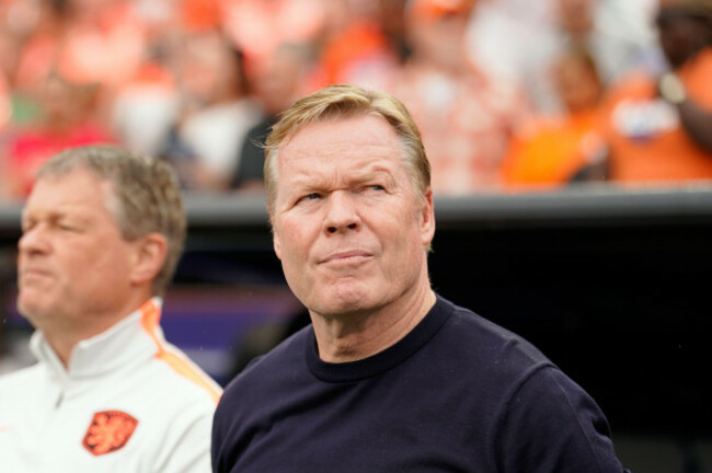 netherlands-head-coach-ronald-koeman-stands-by-the-bench-before-the-world-cup-group-f-soccer-match-between-tunisia-and-the-netherlands-in-kansas-city-mo-thursday-june-25-2026-ap-photoed-zurga