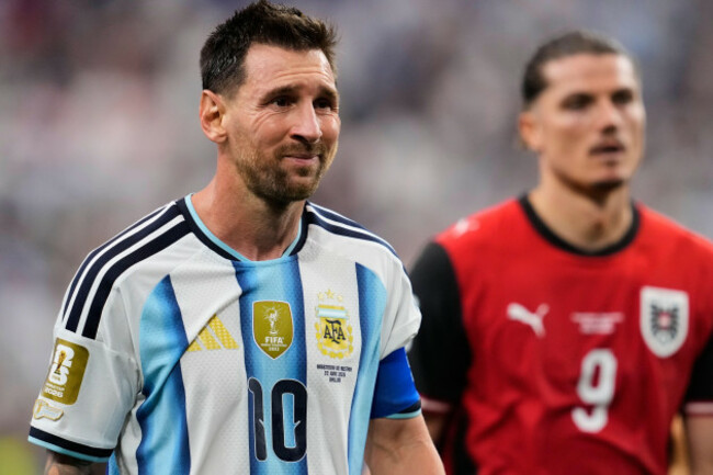 argentinas-lionel-messi-10-and-austrias-marcel-sabitzer-9-walk-off-the-pitch-after-the-world-cup-group-j-soccer-match-between-argentina-and-austria-in-arlington-texas-near-dallas-monday-june