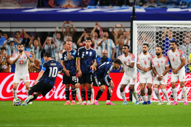 argentinas-lionel-messi-second-from-left-scores-his-sides-third-goal-on-a-free-kick-during-the-world-cup-group-j-soccer-match-against-jordan-in-arlington-texas-near-dallas-saturday-june-27-20