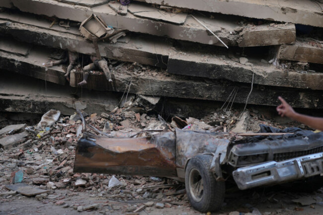 eds-note-graphic-content-bodies-remain-trapped-under-the-rubble-of-a-collapsed-building-three-days-after-an-earthquake-struck-la-guaira-venezuela-saturday-june-27-2026-ap-photomatias-delacro