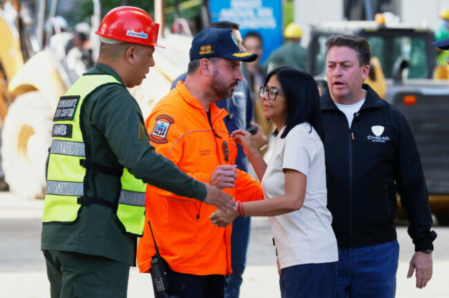 acting-president-delcy-rodriguez-visits-a-quake-damaged-area-where-rescue-workers-are-searching-for-survivors-in-caracas-venezuela-friday-june-26-2026-two-days-after-twin-earthquakes-struck-the-c