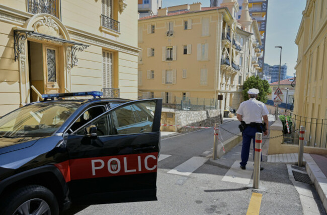 a-police-officer-guards-in-a-street-in-monaco-tuesday-june-30-2026-a-day-after-an-explosive-device-seriously-injured-three-people-at-a-residential-building-in-monaco-ap-photophilippe-magoni