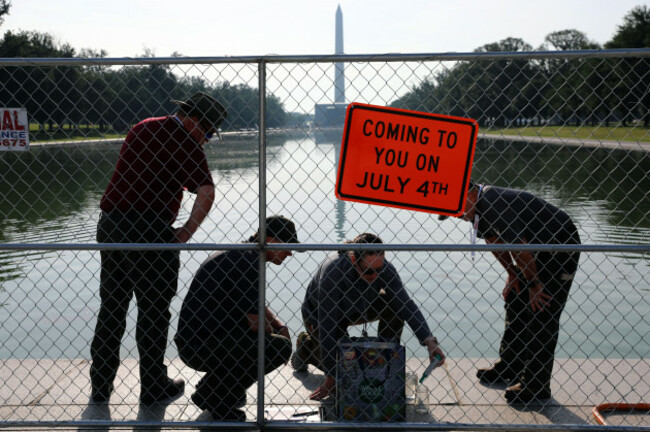 national-park-service-staff-test-the-water-at-the-lincoln-memorial-reflecting-pool-tuesday-june-30-2026-in-washington-ap-photorahmat-gul