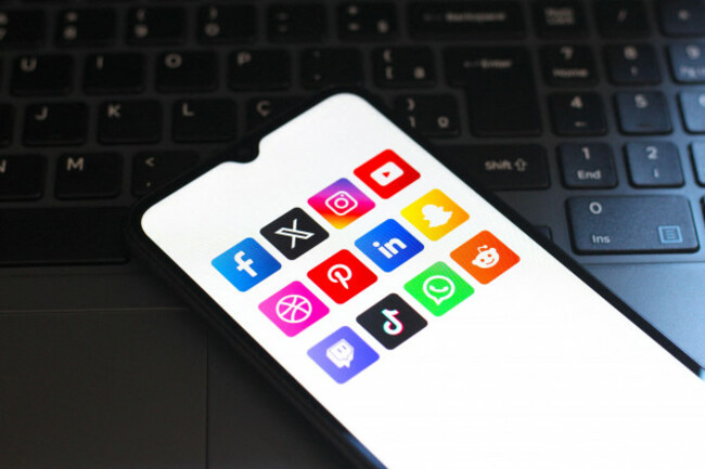 in-this-photo-illustration-the-facebook-twitter-x-instagram-youtube-pinterest-linkedin-snapchat-twitch-tiktok-whatsapp-and-reddit-logos-are-seen-displayed-on-a-smartphone-screen