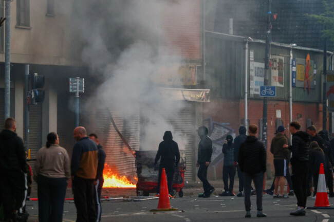 a-building-is-set-light-to-by-protesters-in-central-belfast-following-a-stabbing-incident-in-belfast-tuesday-june-9-2026-ap-photopeter-morrison
