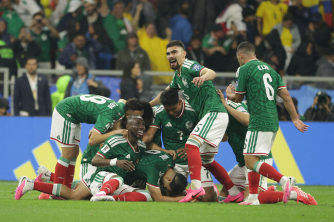 raul-jimenez-9-of-mexico-celebrating-after-scoring-his-teams-second-goal-whit-his-teammates-during-the-fifa-word-cup-2026-round-of-32-match-between-mexico-and-ecuador-at-mexico-city-stadium-mexico