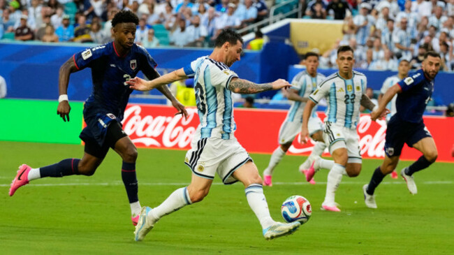 argentinas-lionel-messi-10-controls-the-ball-before-scoring-their-first-goal-during-the-world-cup-round-of-32-soccer-match-between-argentina-and-cape-verde-in-miami-gardens-fla-friday-july-3-2