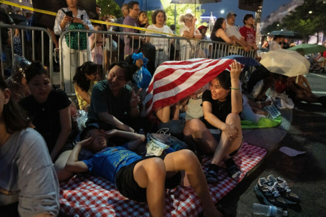 attendees-outside-the-national-mall-following-a-weather-delay-announcement-at-the-national-mall-during-an-independence-day-event-honoring-the-nations-250th-anniversary-saturday-july-4-2026-in-was