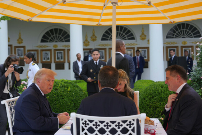 president-donald-trump-from-left-sits-at-a-lunch-with-susan-dell-and-dell-ceo-michael-dell-in-the-white-house-rose-garden-monday-july-6-2026-in-washington-ap-photojulia-demaree-nikhinson