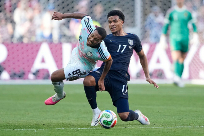 belgiums-youri-tielemans-8-reacts-as-he-is-tackled-by-united-states-malik-tillman-17-during-the-world-cup-round-of-16-soccer-match-between-the-united-states-and-belgium-in-seattle-monday-july