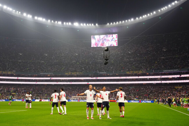 a-general-view-as-englands-jude-bellingham-centre-celebrates-scoring-their-sides-first-goal-of-the-game-with-team-mates-during-the-fifa-world-cup-round-of-16-match-at-mexico-city-stadium-mexico