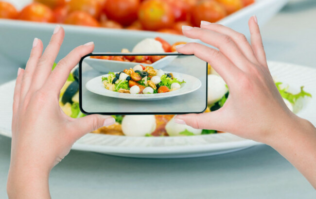 selective-focus-shot-of-a-females-hands-photographing-a-healthy-salad-with-a-smartphone