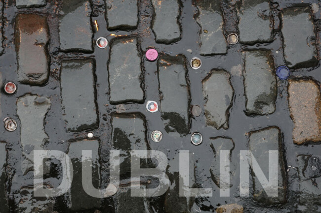 bottle-caps-between-paving-stones-in-temple-bar-dublin-ireland
