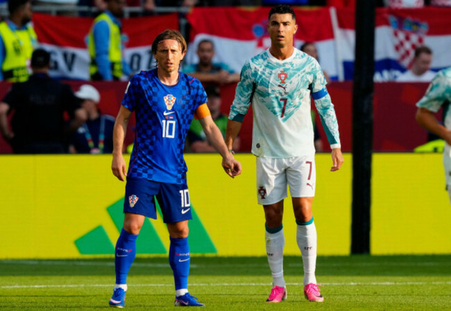 toronto-canada-02nd-july-2026-croatias-luka-modric-10-and-portugals-cristiano-ronaldo-7-watch-the-play-during-the-first-half-of-a-world-cup-round-of-32-soccer-match-in-toronto-on-thursday