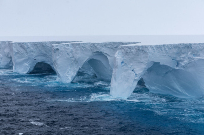 iceberg-a23a-largest-iceberg-on-the-planet-drifting-north-in-the-southern-ocean-iceberg-showing-signs-of-decay-with-arches-and-caves-appearing