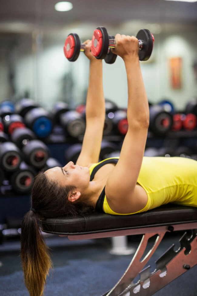 woman-working-out-with-weights