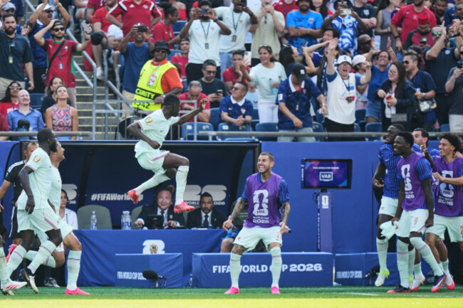 frances-ousmane-dembele-7-celebrates-after-scoring-his-sides-second-goal-during-the-world-cup-quarterfinal-soccer-match-between-france-and-morocco-in-foxborough-mass-near-boston-thursday-july