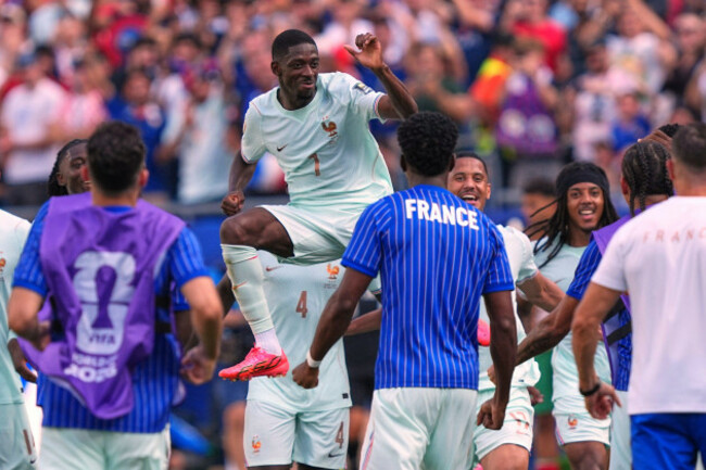 frances-ousmane-dembele-7-celebrates-after-scoring-his-sides-second-goal-during-the-world-cup-quarterfinal-soccer-match-between-france-and-morocco-in-foxborough-mass-near-boston-thursday-july
