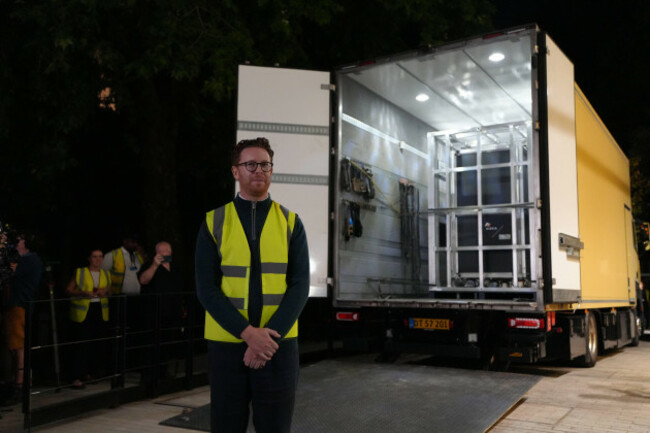 british-museum-director-nicholas-cullinan-standing-in-front-of-a-truck-that-carried-the-bayeux-tapestry-from-france-at-the-british-museum-in-london-friday-july-10-2026-ap-photokwiyeon-ha