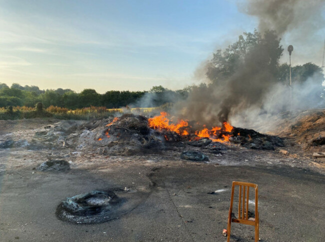 the-remains-of-the-moygashel-bonfire-which-had-a-replica-mosque-placed-on-top-and-has-been-set-alight-overnight-before-the-display-could-be-removed-ahead-of-events-to-mark-the-twelfth-july-the-bonf