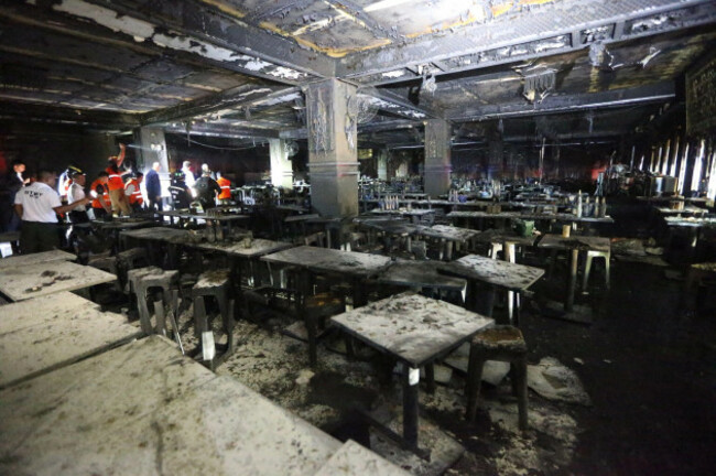 bangkok-thailand-13th-july-2026-rescuers-work-at-a-pub-where-a-fire-broke-out-in-bangkok-thailand-july-13-2026-a-fire-at-a-pub-near-lat-phrao-road-in-bangkoks-chatuchak-district-killed-27-peo