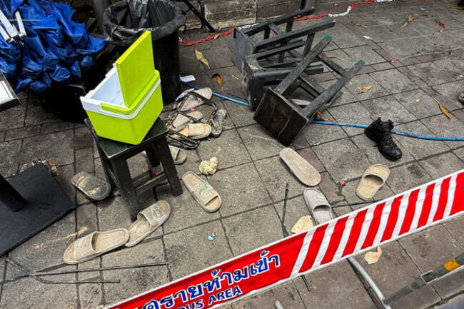 bangkok-thailand-13th-july-2026-bath-slippers-are-lying-on-the-ground-in-front-of-the-rong-beer-na-ladprao-bar-after-a-fire-credit-carola-frentzendpaalamy-live-news