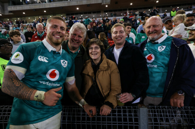 sean-jansen-celebrates-with-his-father-fred-mother-kathleen-brother-ciaran-and-uncle-luke-after-the-game