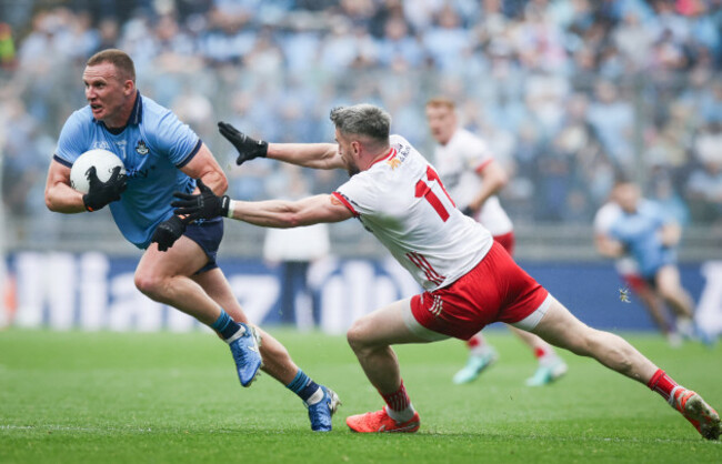 ciaran-kilkenny-is-challenged-by-mattie-donnelly