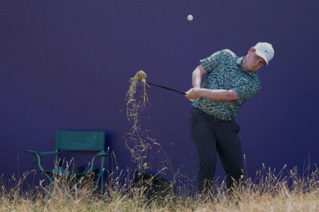 robert-macintyre-of-scotland-chips-out-of-the-rough-onto-the-18th-green-during-the-first-day-of-the-british-open-golf-championships-at-royal-birkdale-golf-club-in-southport-england-thursday-july-1