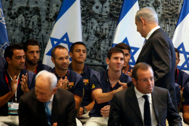 israeli-minister-benjamin-netenyahu-right-shakes-hands-with-fc-barcelona-player-lionel-messi-during-a-ceremony-at-the-presidents-residence-in-jerusalem-israel-sunday-aug-4-2013-ap-photoli