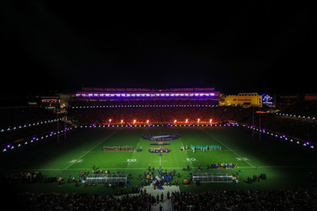 a-wide-view-of-both-teams-ahead-of-the-game