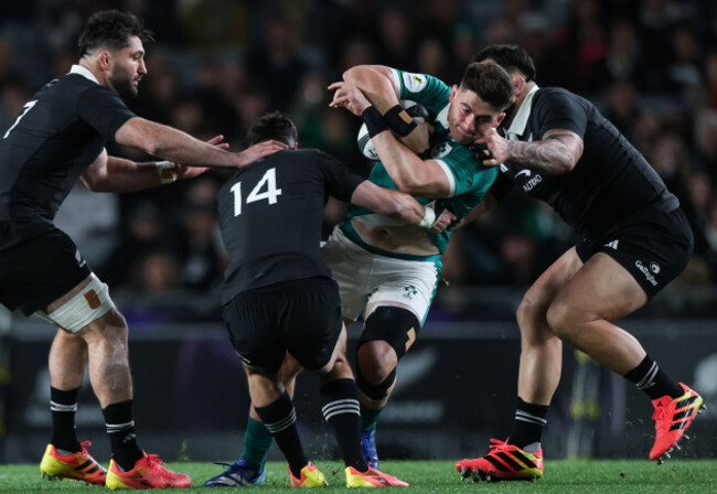 dan-sheehan-is-tackled-by-luke-jacobson-will-jordan-and-tyrel-lomax
