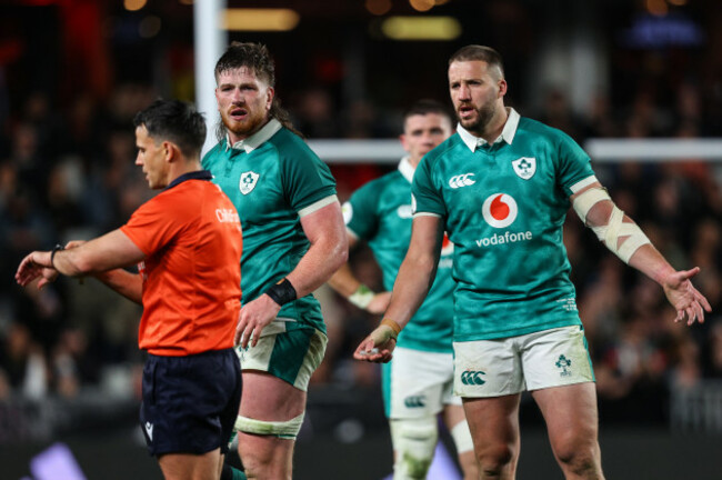 joe-mccarthy-and-stuart-mccloskey-protest-to-nic-berry-after-the-final-whistle-is-blown