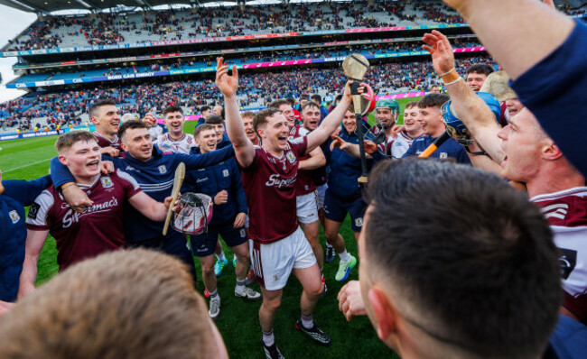 tom-monaghan-celebrates