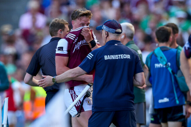 ronan-glennon-is-consoled-by-manager-micheal-donoghue-after-being-shown-a-red-card