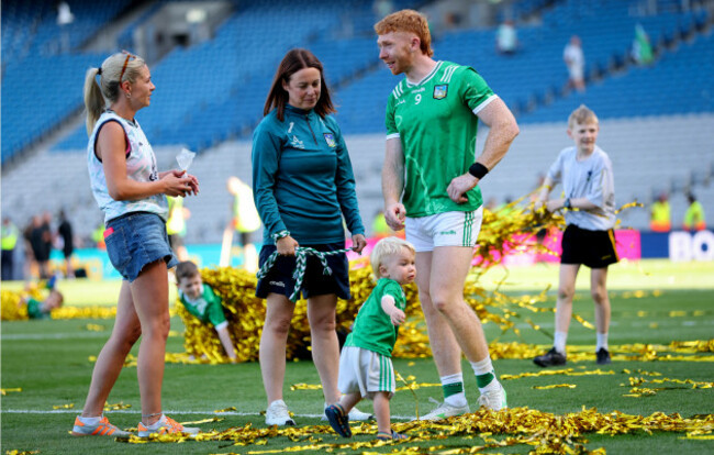 caroline-currid-celebrates-with-cian-lynch-his-girlfriend-dayna-and-his-son-after-the-match